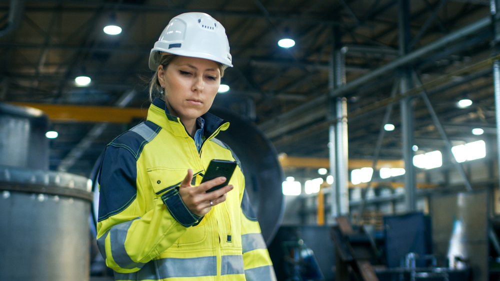 worker checking phone